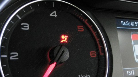 What does the SRS (Supplement Restraint System) warning light tell you?